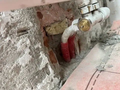 Detail van een radiatoraansluiting