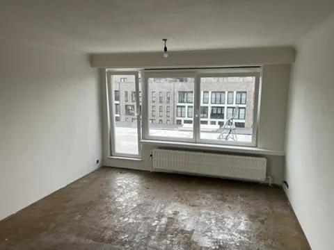 Woonkamer voor de renovatie